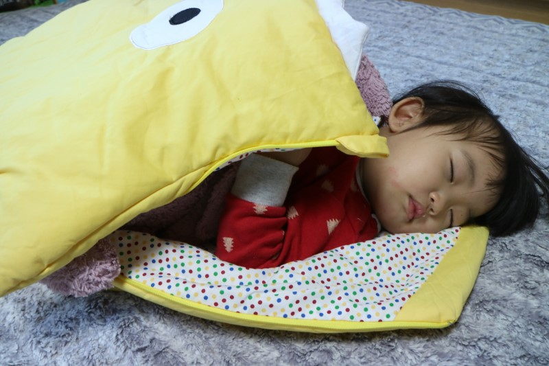 Photo of the boy with the yellow blanket